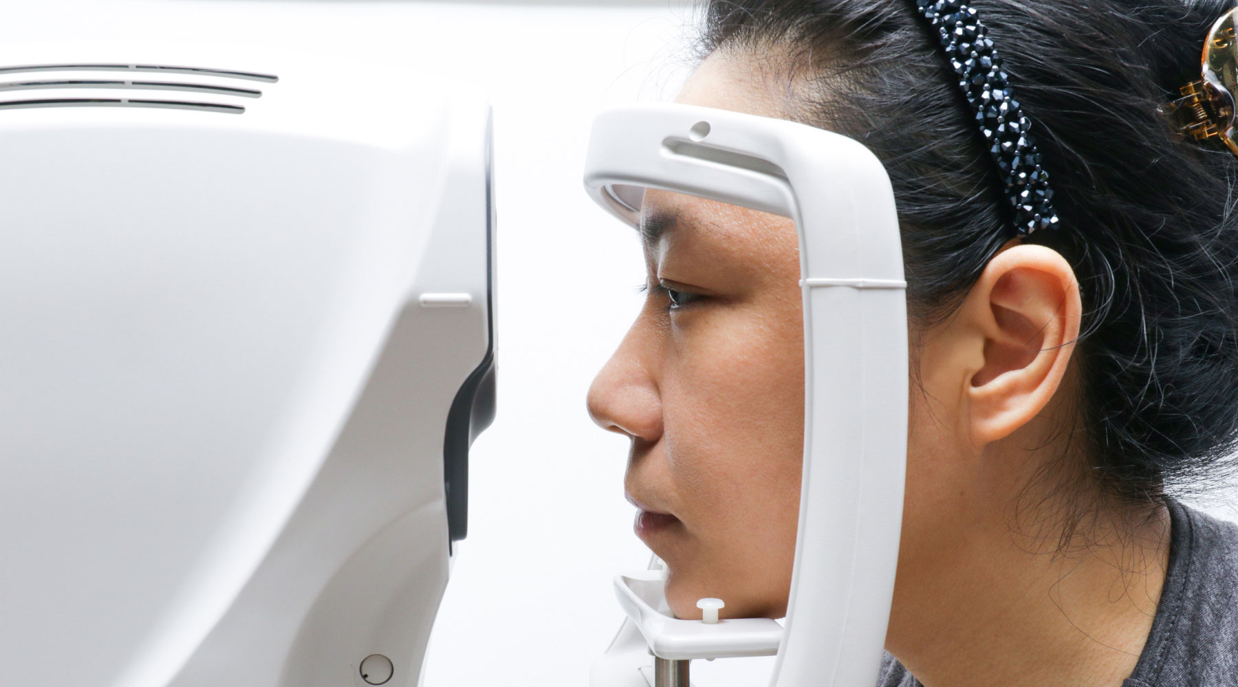 An individual has their eye scanned in a machine