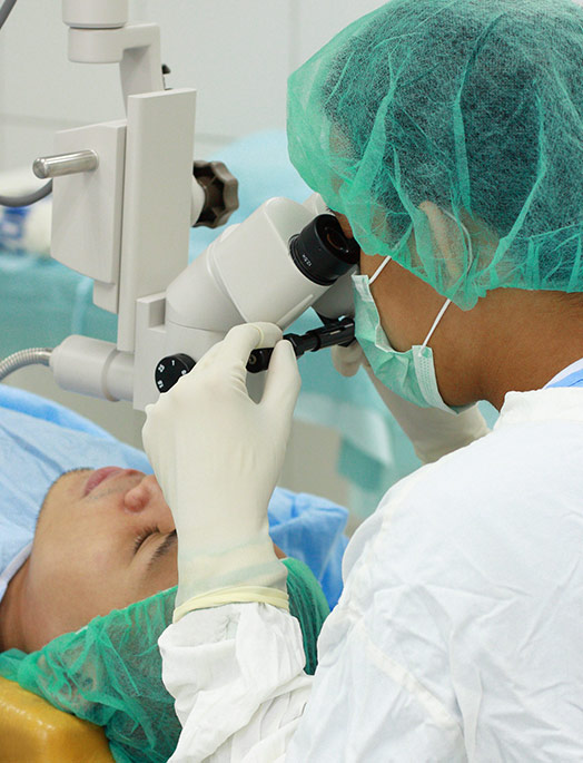 man having eyes examined