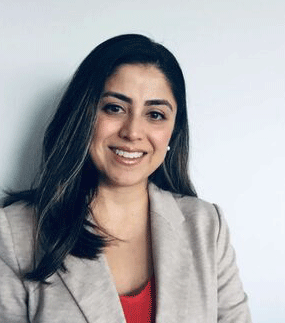 Dr. Neda Khadem smiling against a plain white background
